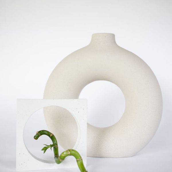 Minimalist composition with stones and bamboo representing balance